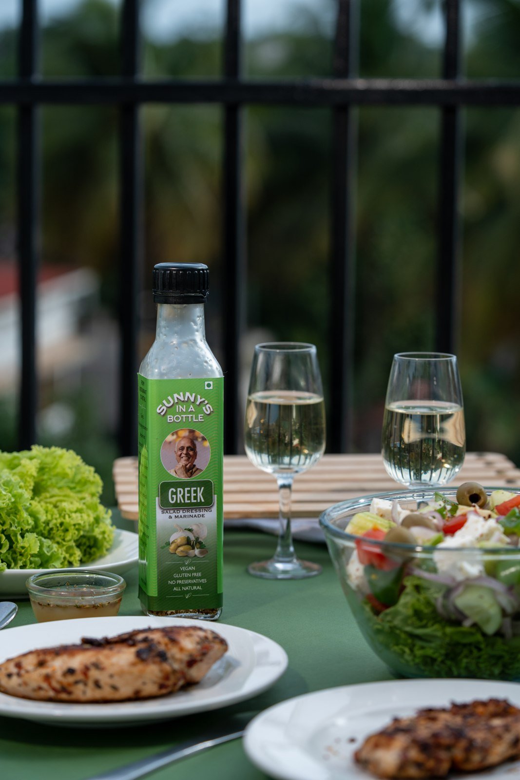 Sunny's In A Bottle Greek dressing on the dining table